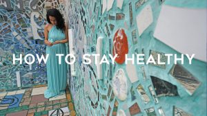 Girl holding blue birdie with title "How to stay healthy" in mosaic corner