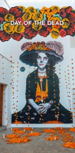 Day of the Dead Pin of woman on wall in skull makeup