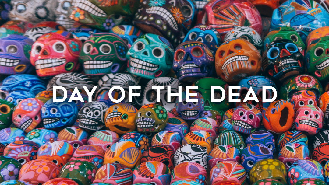 Day of the dead written over colorful skull souvenirs