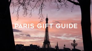 pink sky sunset with eiffel tower and title "Paris Gift Guide"