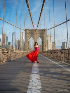 Top Instagram Photos of the Brooklyn Bridge The Travel Women girl in red dress