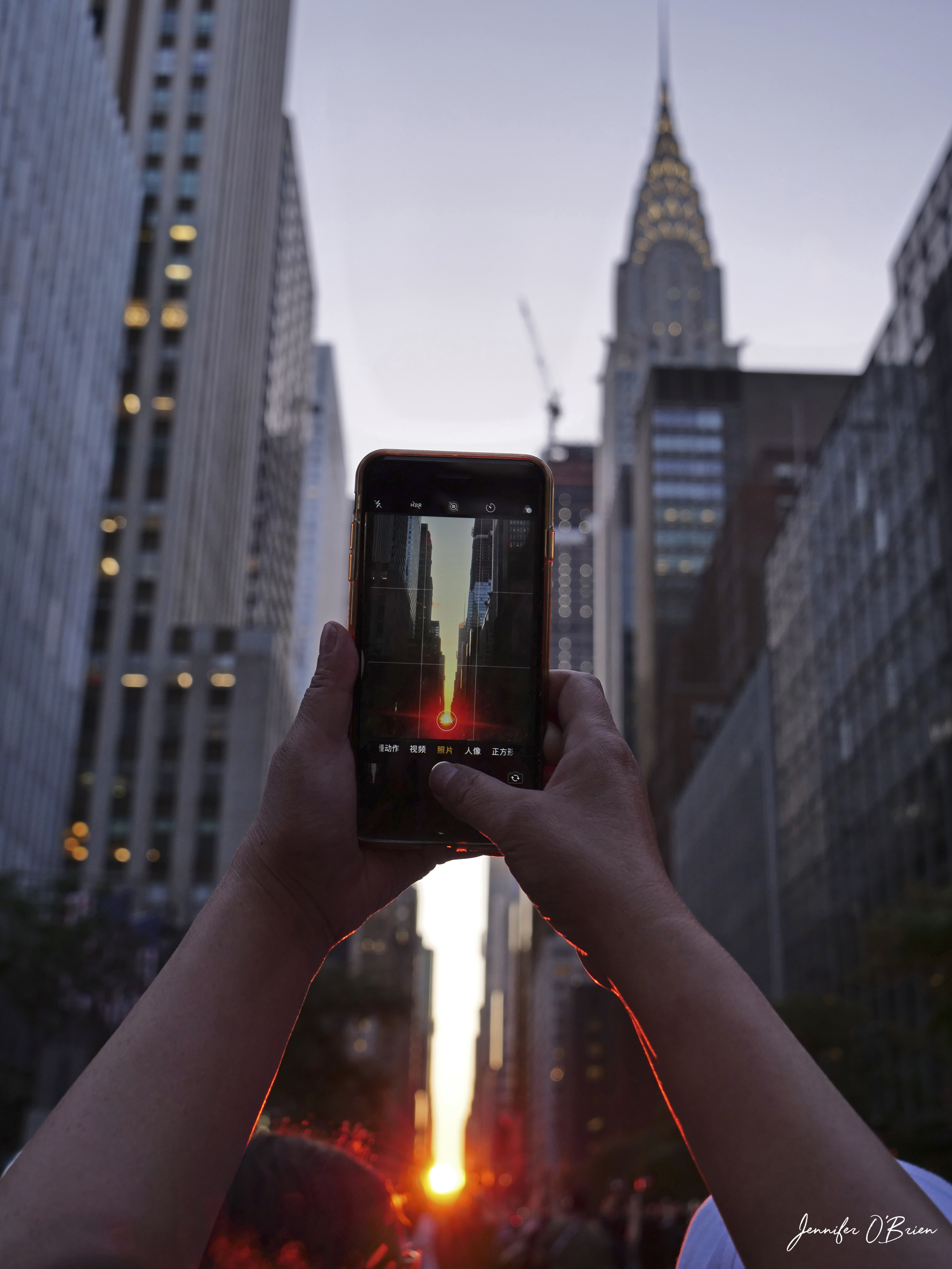 Manhattanhenge sunset NYC 42nd street Tudor City iphone Chrysler Building
