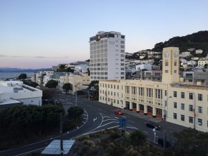 Wellington capital city NZ New Zealand Kaeli Conforti photo of a main street with red car on it