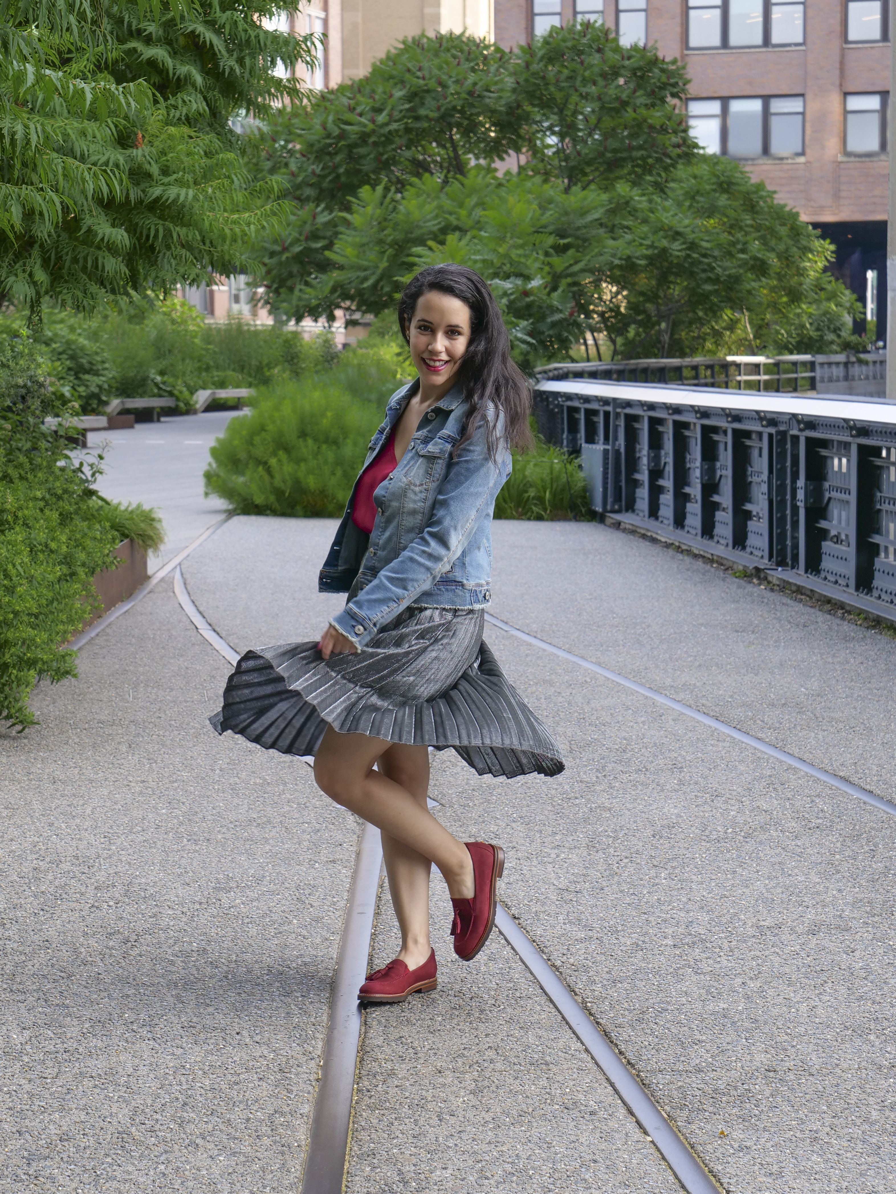 High Line elevated NYC park railroad tracks Instagram spot girl in silver skirt with red shoes