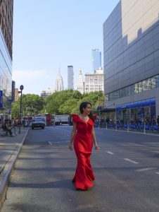 Empire State Building woman red dress union square street