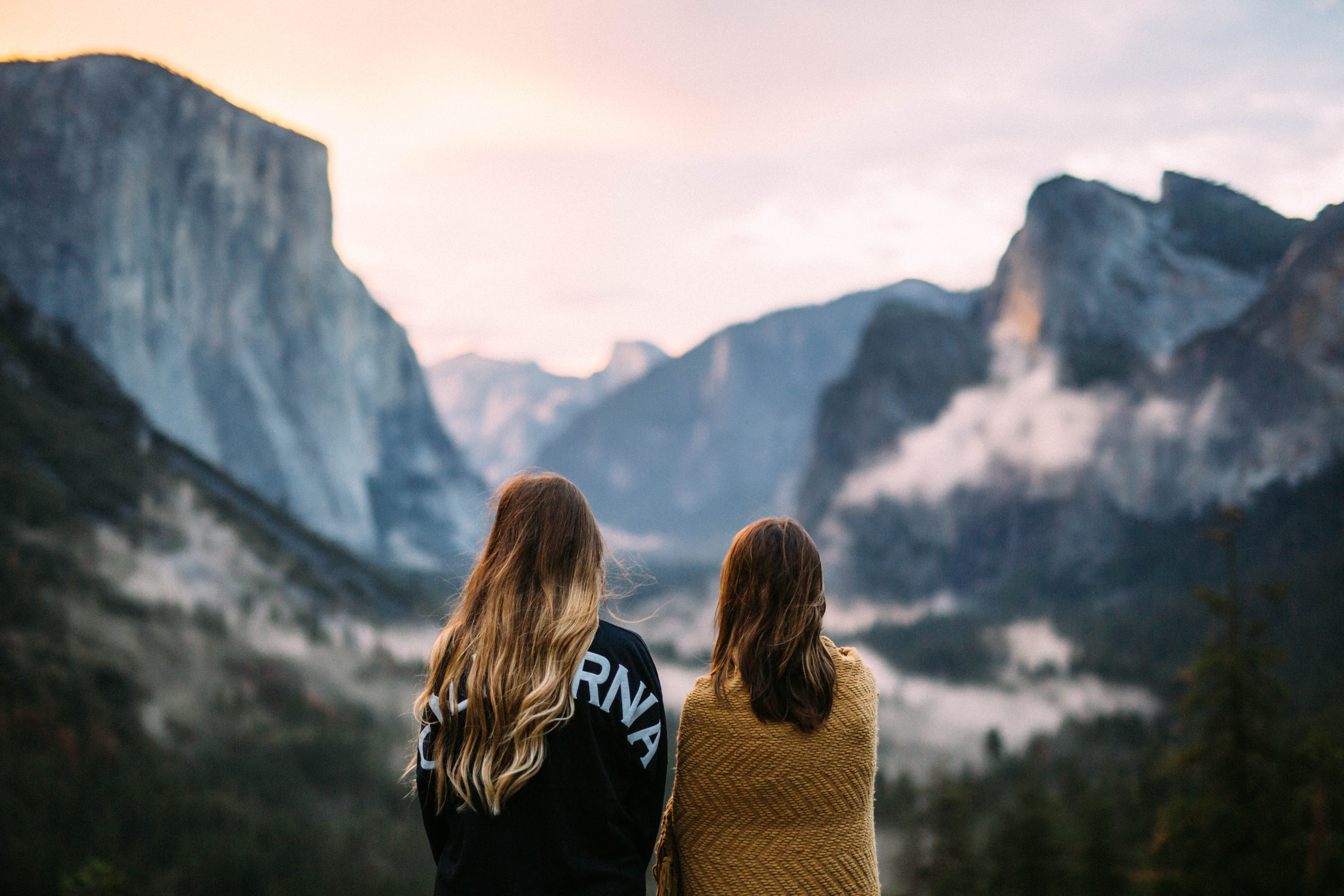 4. Yosemite National Park, California nathan-dumlao-HKZPcz4Jpm8-unsplash two women viewpoint 