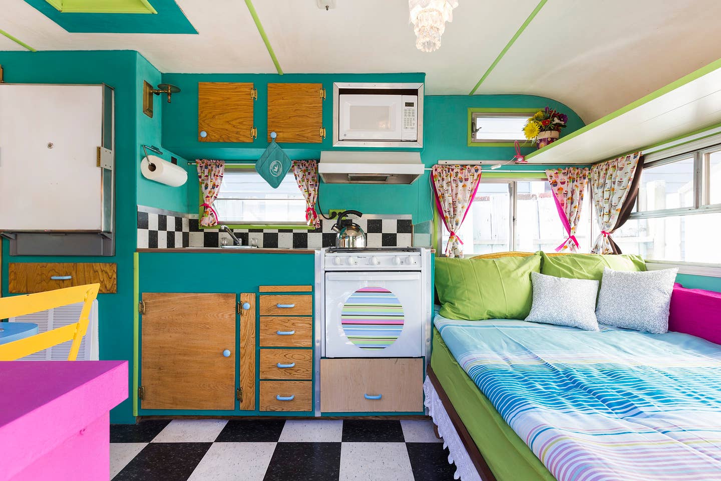 Most Unique USA Airbnbs vintage colorful caravan airstream interior bed