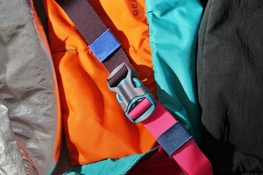 colorful fanny packs cotopaxi buckle Why the Best Bag for Solo Travel is a Fanny Pack